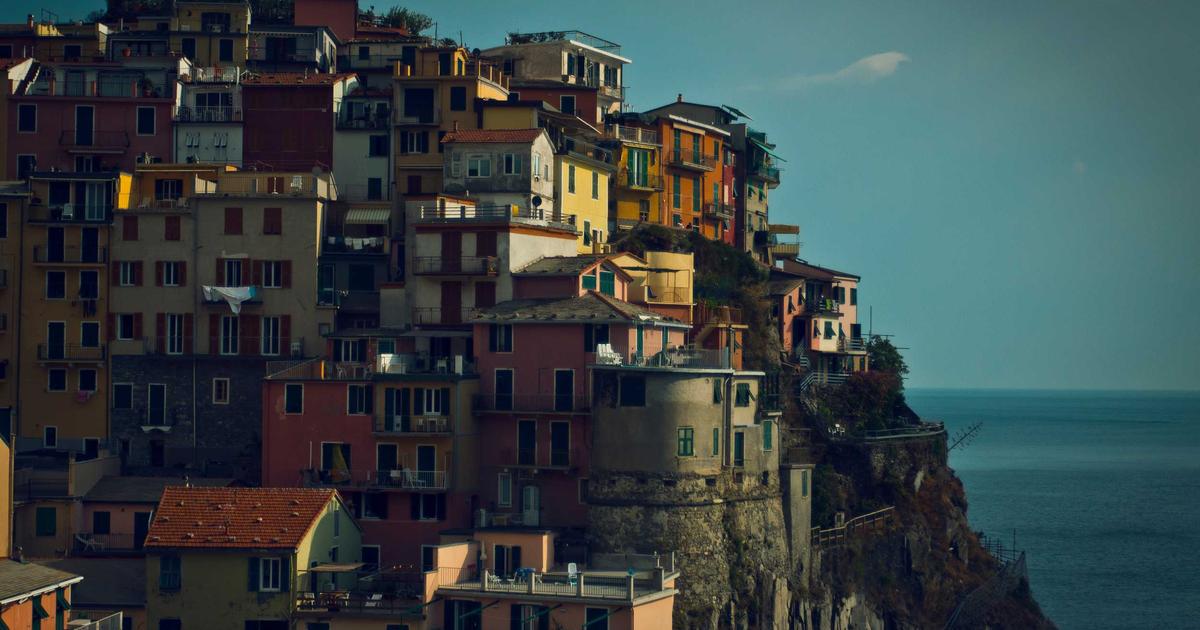 Business owner using free automation tools on laptop